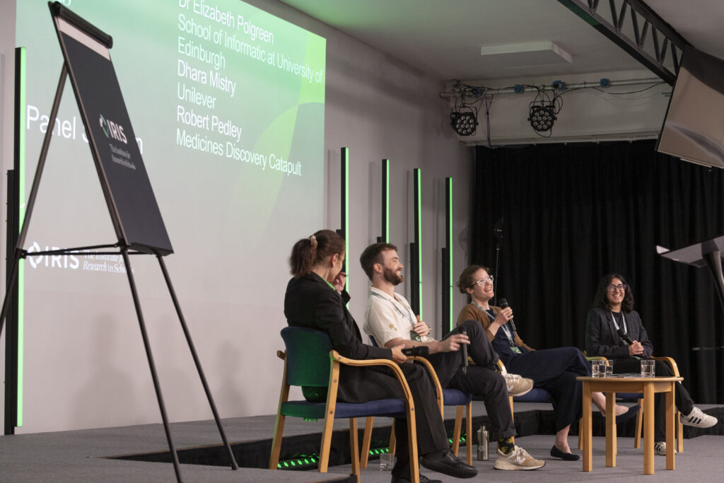 Four panel members on stage in Manchester