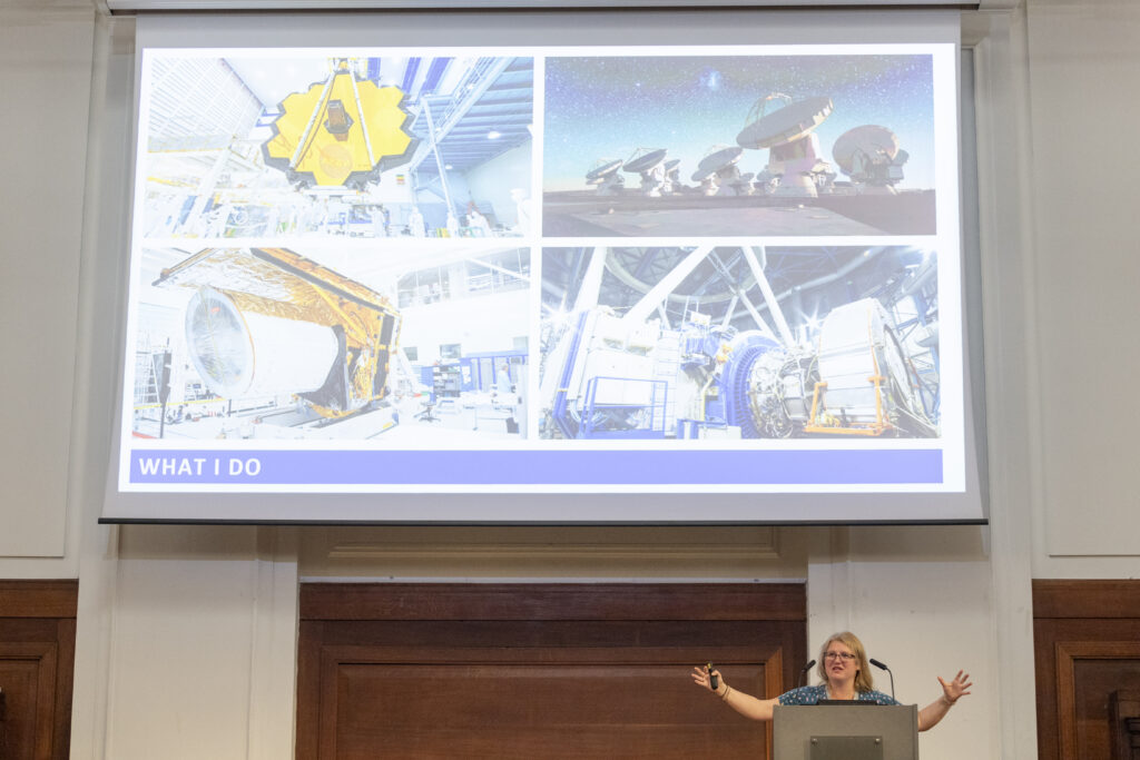Dr Olivia Jones and her presentation on stage in London
